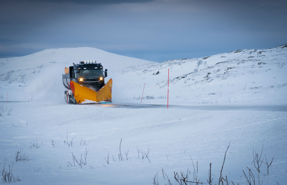 Snowplow,In,Action,On,A,Icy,Road,In,Northern,Norway